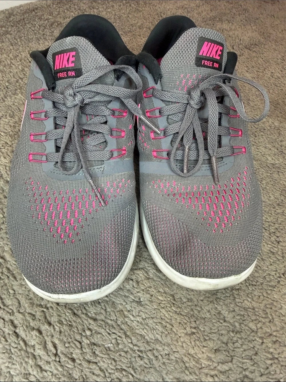 Nike Gray Athletic Sneakers with Pink Swoosh